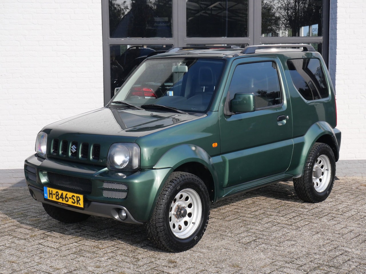 Suzuki Jimny - 1.3 JLX 4x4 Met nieuwe Apk - AutoWereld.nl