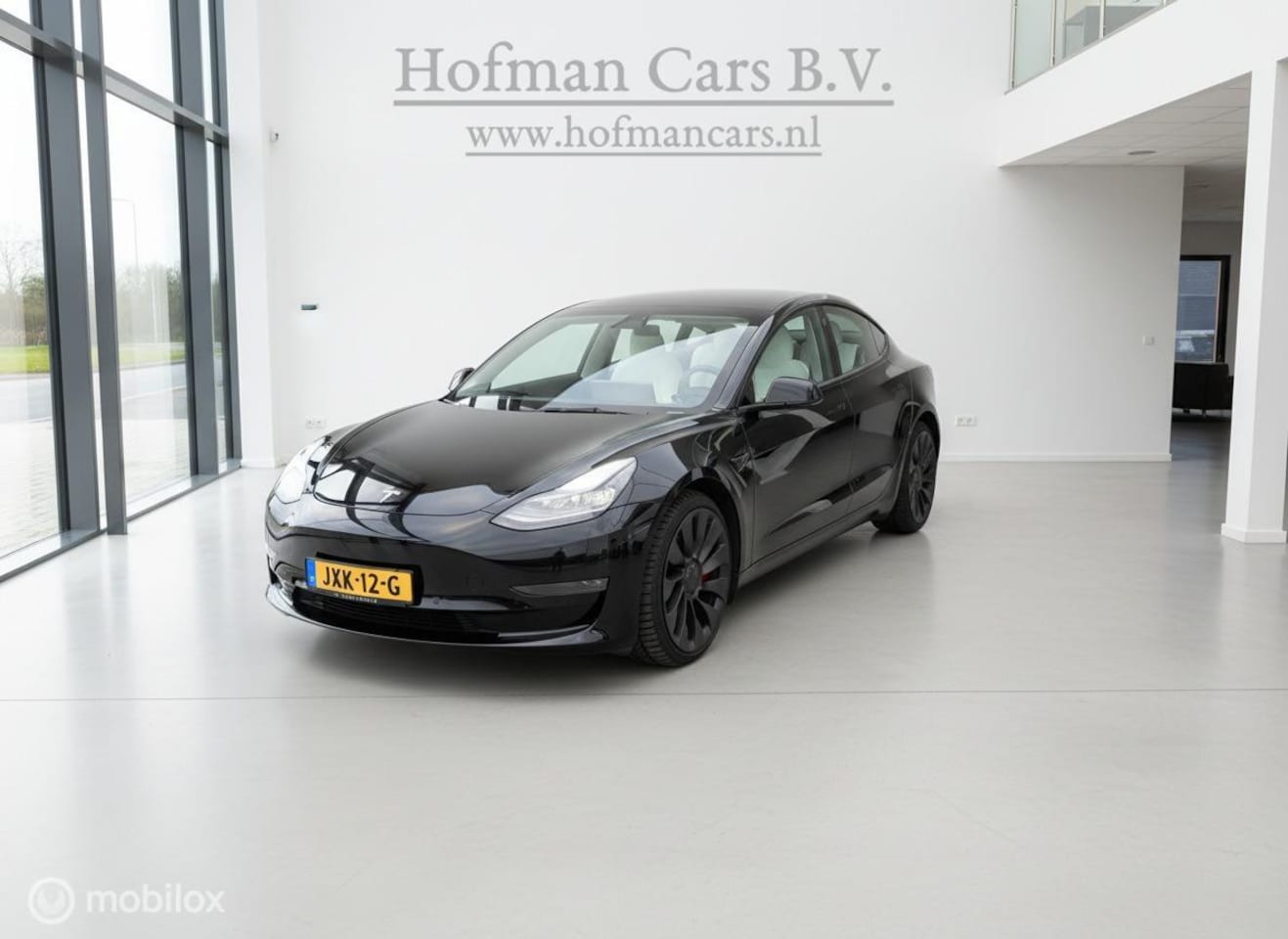 Tesla Model 3 - Performance AWD 75 kWh | 12/2021 | 463 pk | Wit Interieur | Warmtepomp - AutoWereld.nl