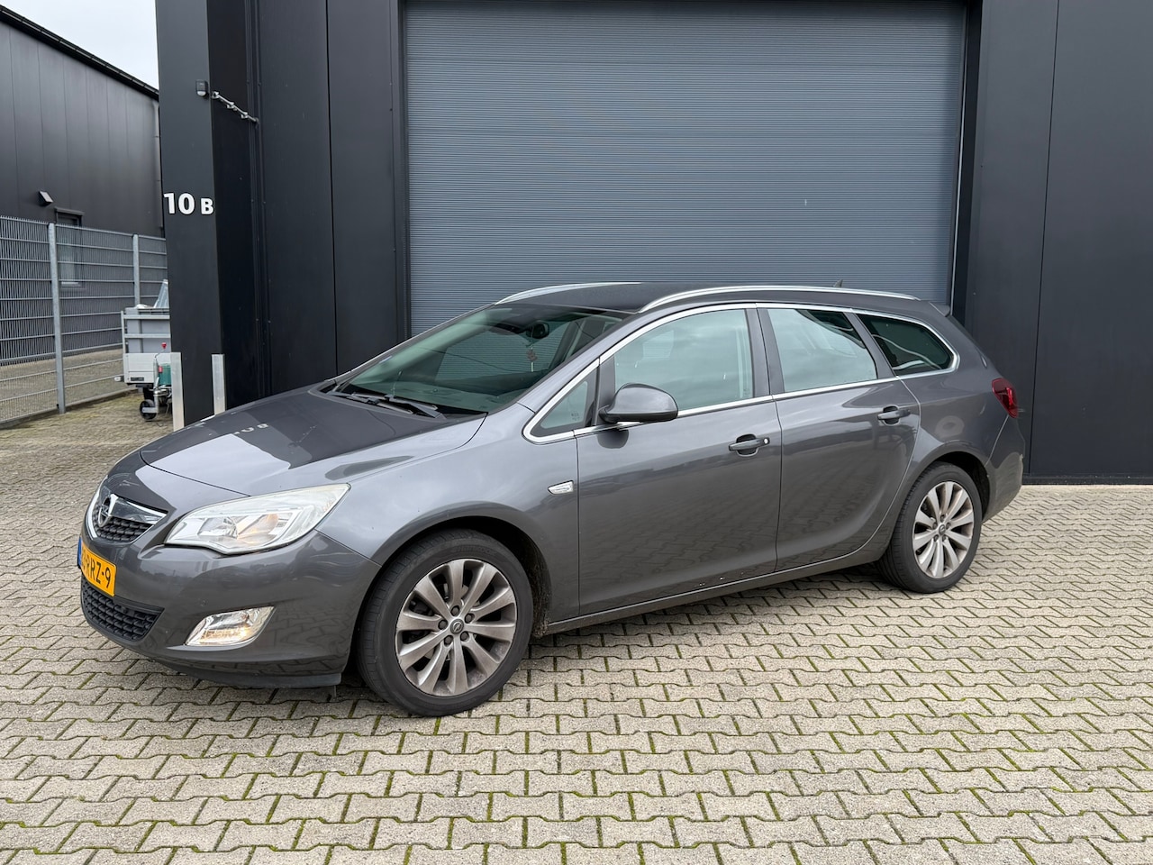 Opel Astra Sports Tourer - 1.4 Turbo EXPORT - AutoWereld.nl