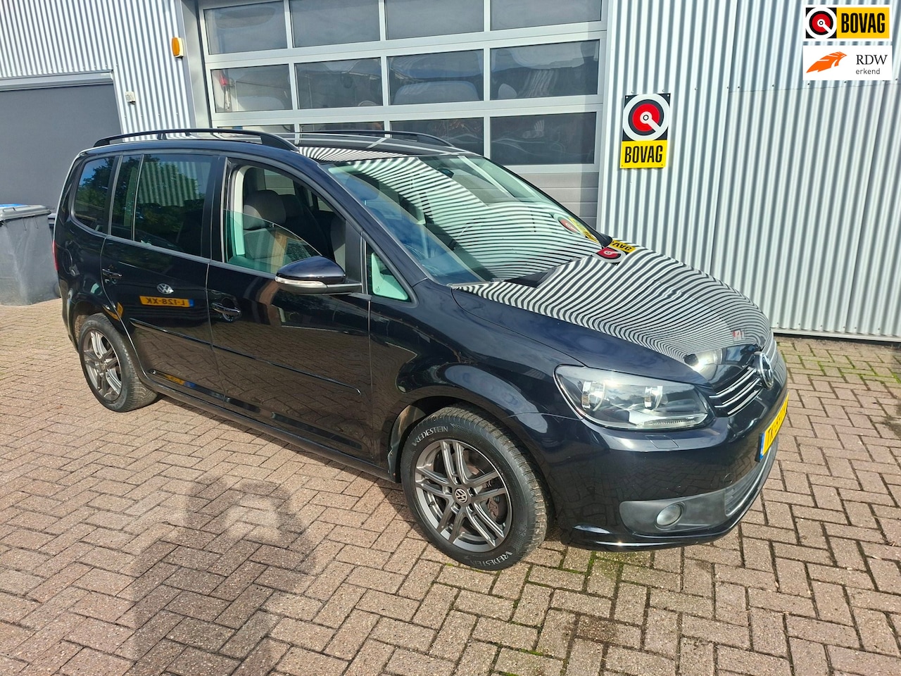 Volkswagen Touran - 1.2 TSI 7pers. Trekhaak Cruise Navi - AutoWereld.nl