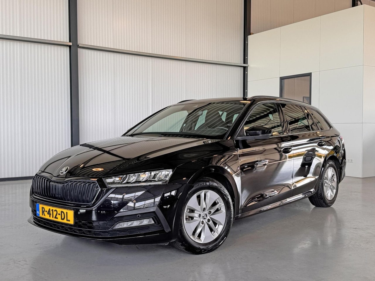 Skoda Octavia Combi - 1.0 TSI Greentech 81kW Sport Business|Navi|CarPlay|Elektr.Wegklapbare Trekhaak| - AutoWereld.nl