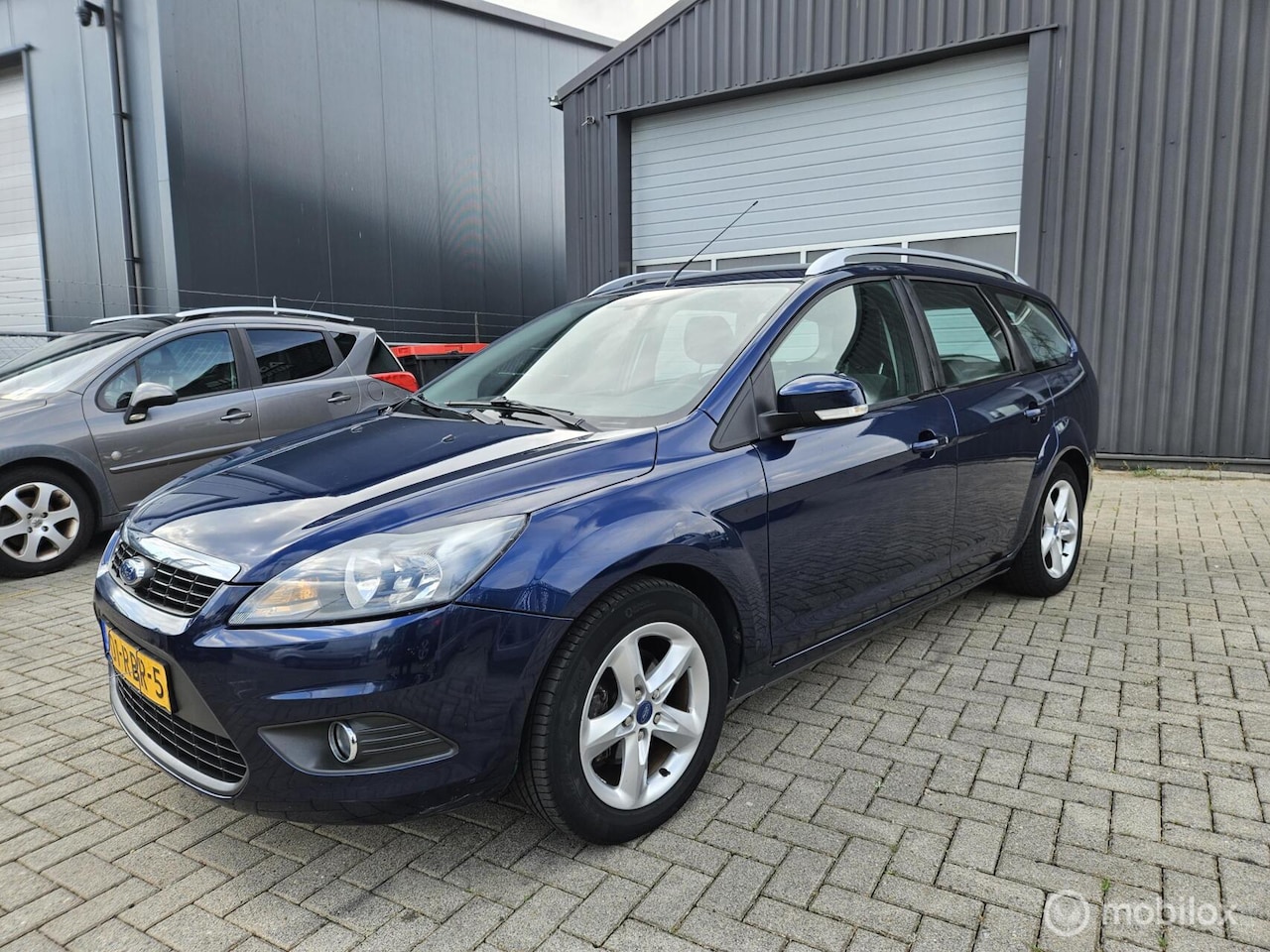 Ford Focus Wagon - 1.6 Comfort AIRCO/CRUISE/TREKHAAK APK 08/2027 VASTEPRIJS - AutoWereld.nl