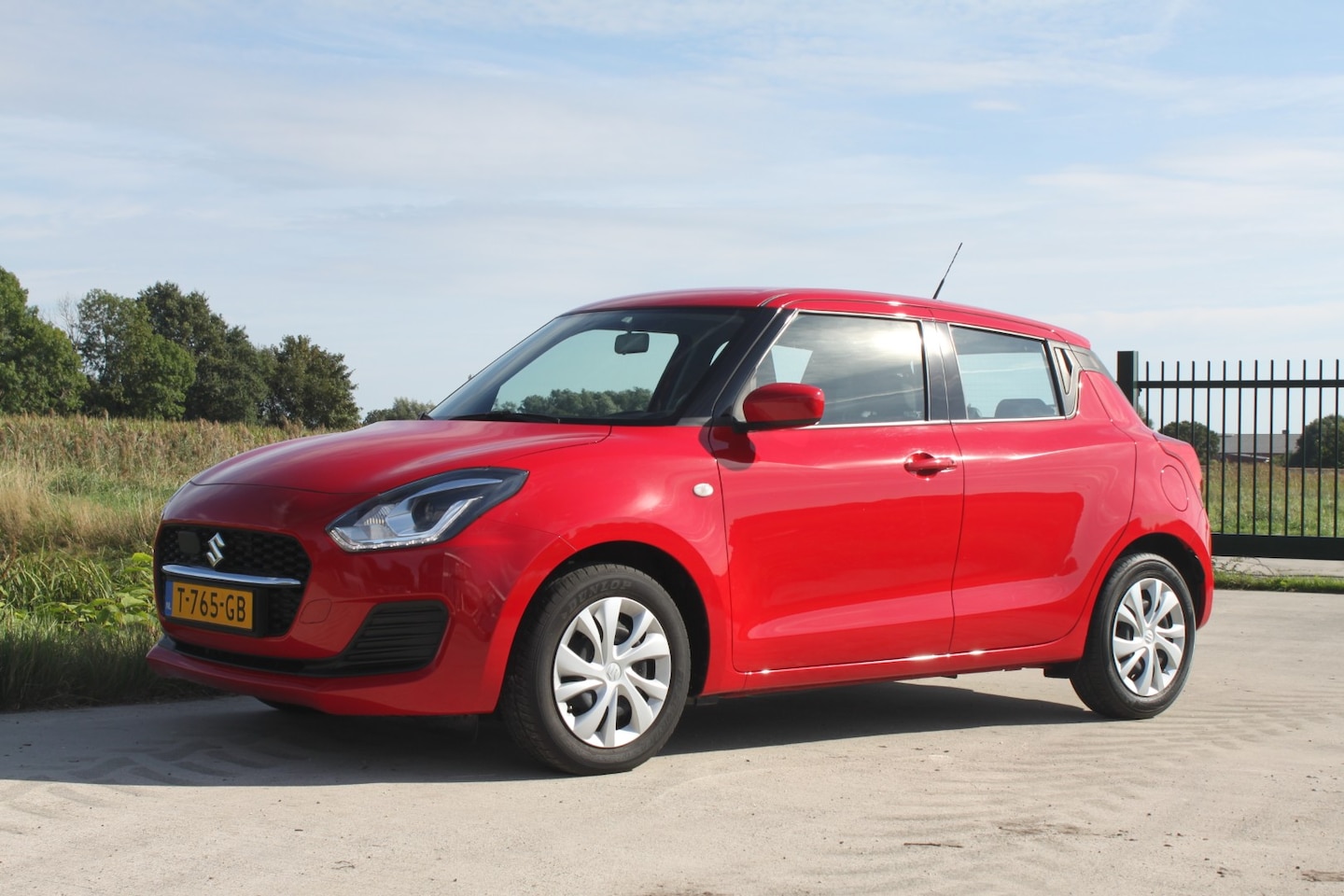 Suzuki Swift - 1.2 Comfort Smart Hybrid - AutoWereld.nl