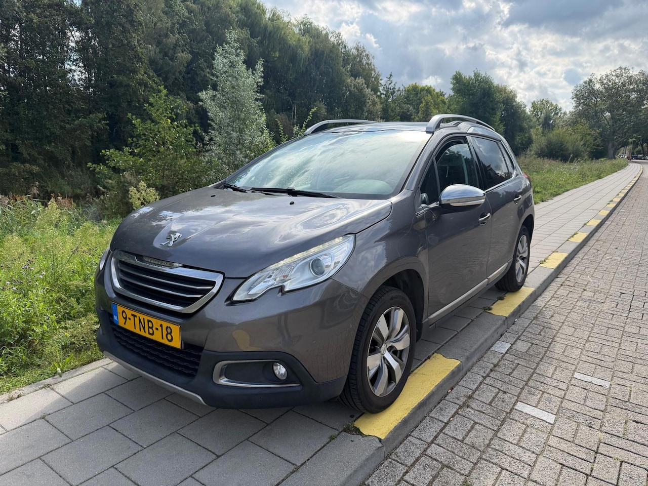 Peugeot 2008 - 1.2 VTi Allure Pack Premium Plus 1.2 VTi Allure Pack Premium Plus - AutoWereld.nl