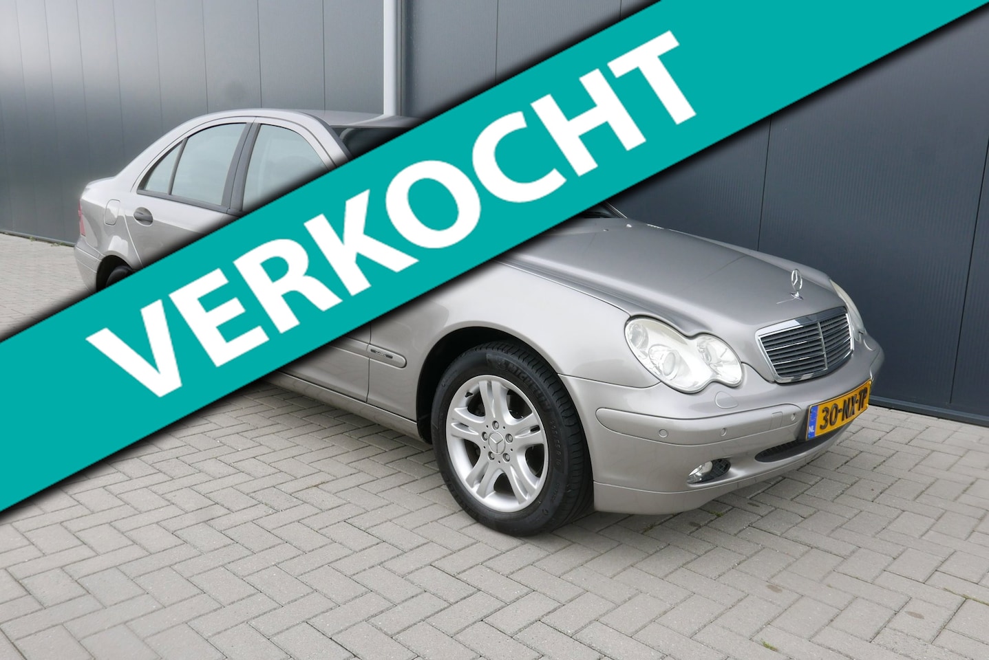 Mercedes-Benz C-klasse - 180 K CLIMA,NAVI,XENON,PDC,TREKHAAK. - AutoWereld.nl