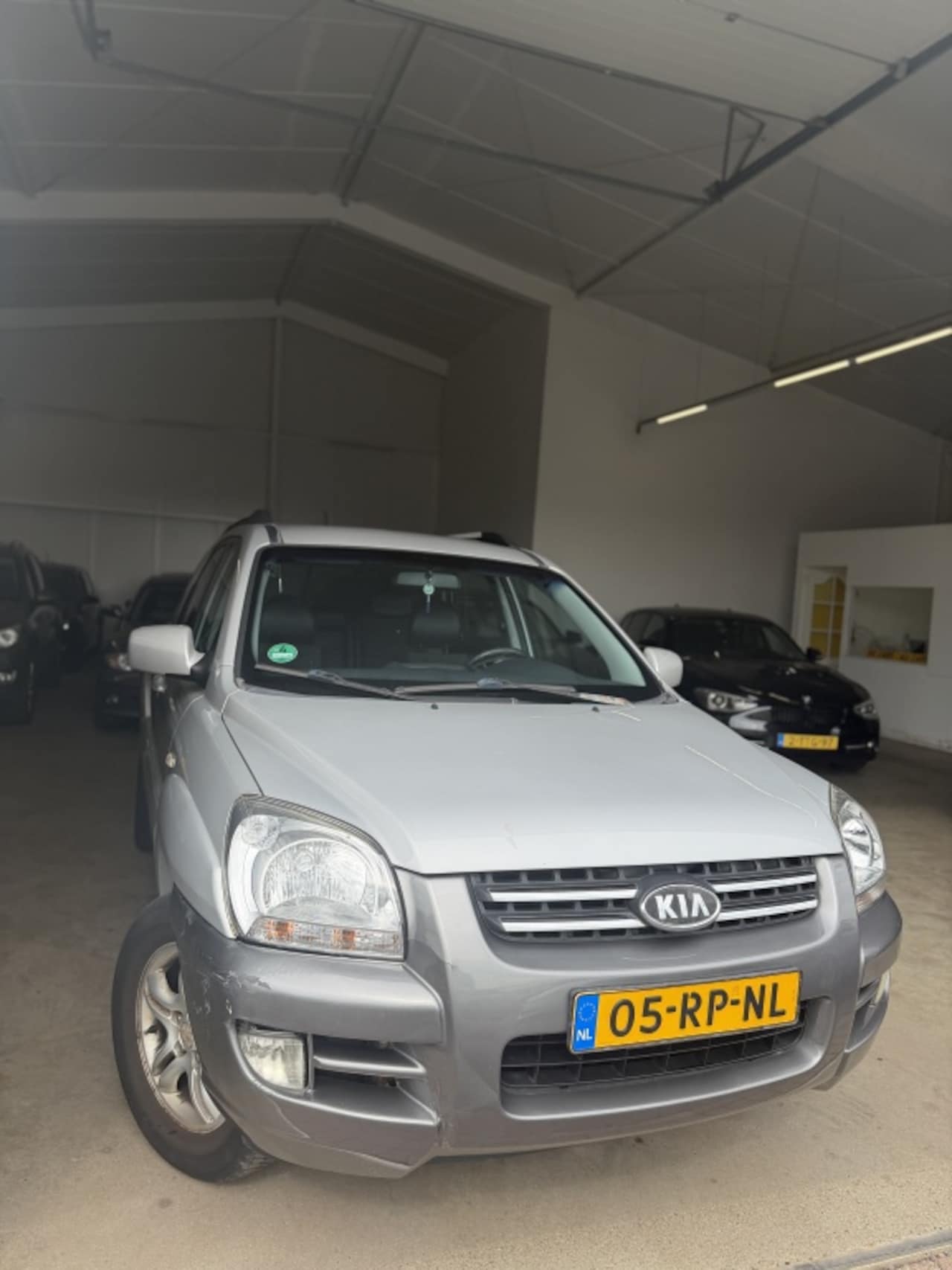 Kia Sportage - 2.0 CVVT Advent. 4WD - AutoWereld.nl
