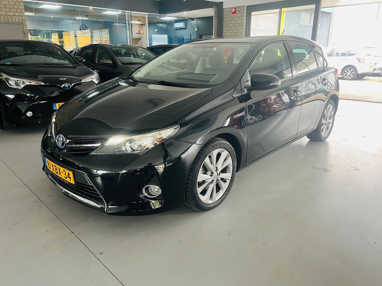 Toyota Auris - 1.8 Hybrid Executive 1.8 Hybrid Executive - AutoWereld.nl