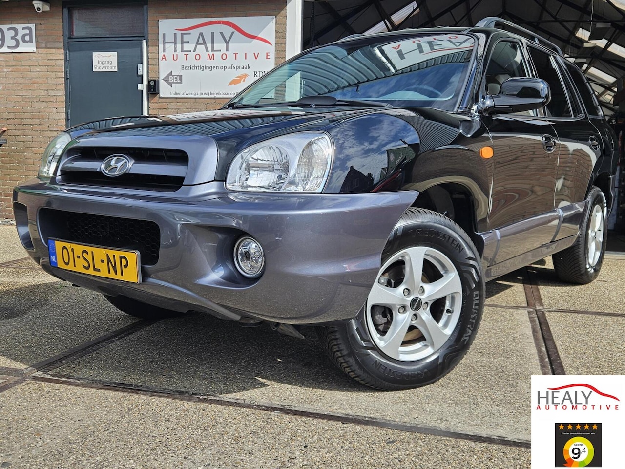 Hyundai Santa Fe - 2.4i-16V Elite|128Dkm|Airco|Cruise|T haak| - AutoWereld.nl
