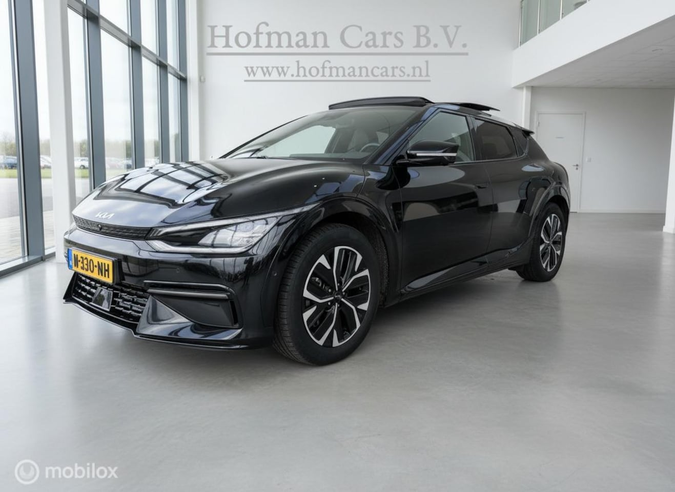 Kia EV6 - GT-Line 77.4 kWh | Zwart | Trekhaak | Panoramadak | 360° Camera | SOH 100 - AutoWereld.nl