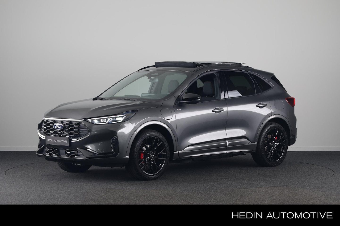 Ford Kuga - 2.5 PHEV ST-Line X Black Pack | Panoramadak | Elektrisch inklapbare trekhaak - AutoWereld.nl