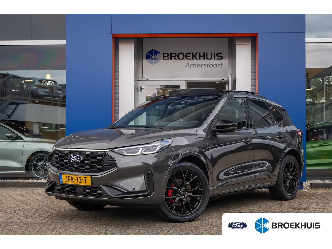 Ford Kuga - 2.5 PHEV ST-Line X | Elek. Panoramadak | Adaptive Cruise Control | Elek. Trekhaak | Elek. - AutoWereld.nl
