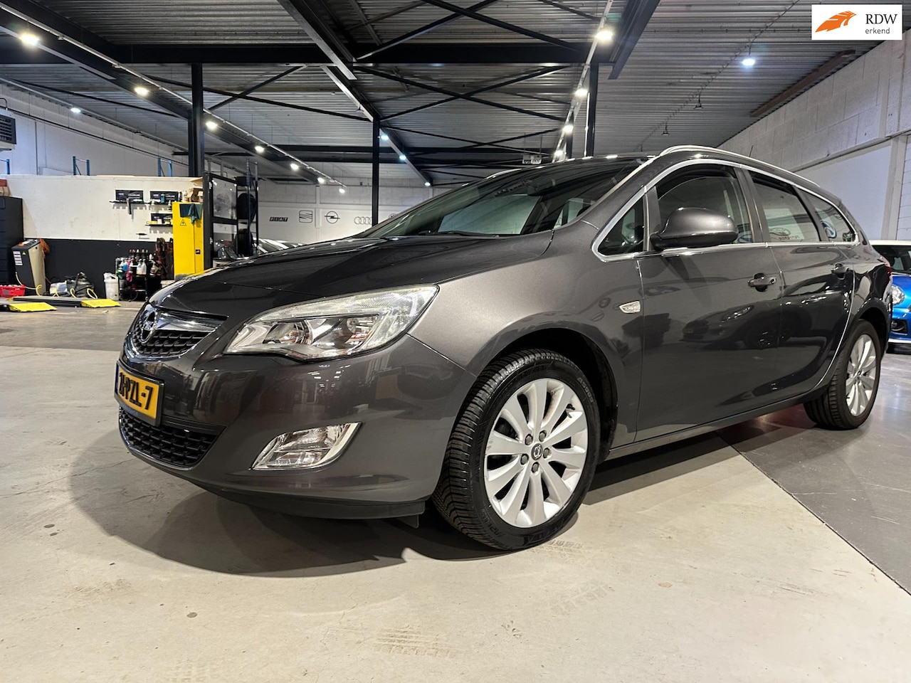 Opel Astra Sports Tourer - 1.4 Turbo Cosmo/Dealer onderhouden/Apk nieuw bij aflevering - AutoWereld.nl