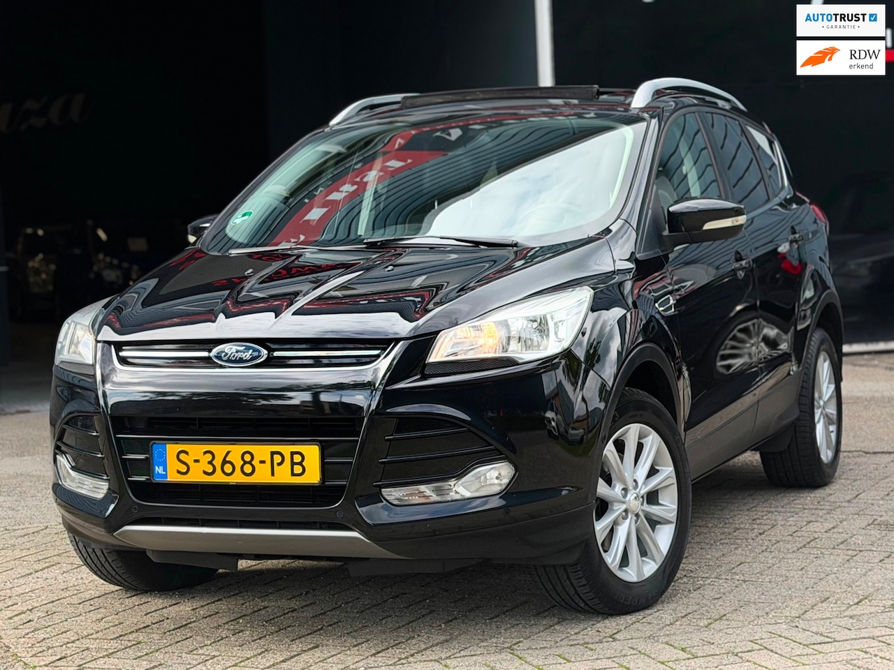 Ford Kuga - 1.5 Titanium PANO/NAVI/KEYLESS-GO/LEDER/CRUISE | KEURIGE AUTO ! - AutoWereld.nl