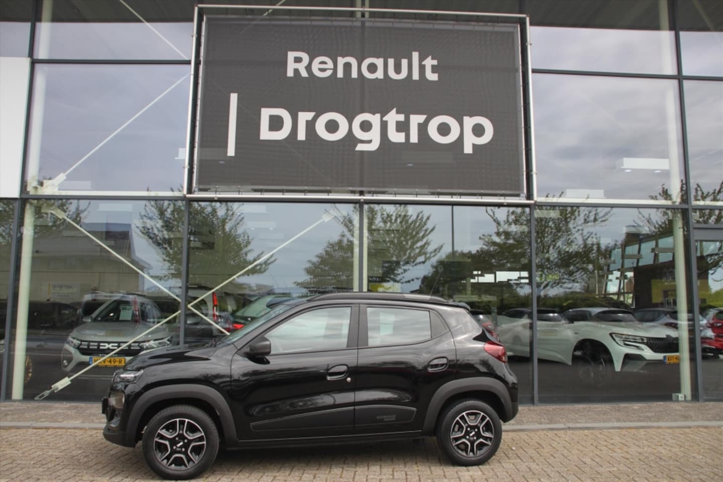 Dacia Spring - EXPRESSION-30DKM-LEDER-NAVI-BLUET-CCS LADER- - AutoWereld.nl