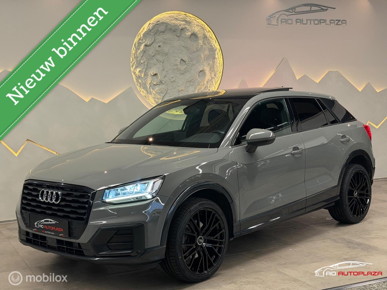 Audi Q2 - 35 TFSI Panorama/Keyless/Nardo grey/Leder/Sfeerverlichting - AutoWereld.nl