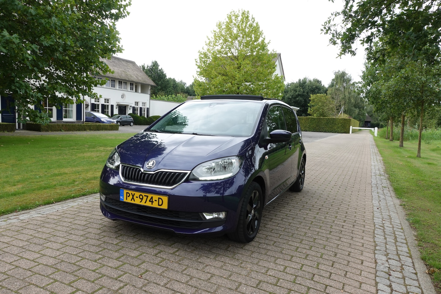 Skoda Citigo - 1.0 Greentech Style | Panorama dak | Cruise Control | Airco | PDC | Bluetooth | - AutoWereld.nl