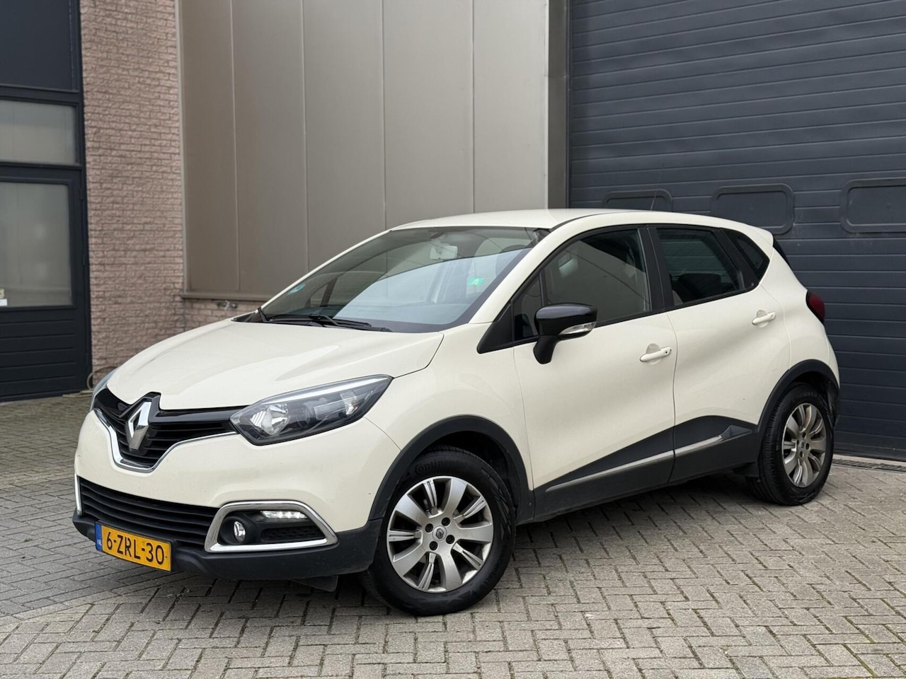 Renault Captur - 0.9 TCe Helly Hansen 2015 Airco/Cruise/Navi - AutoWereld.nl