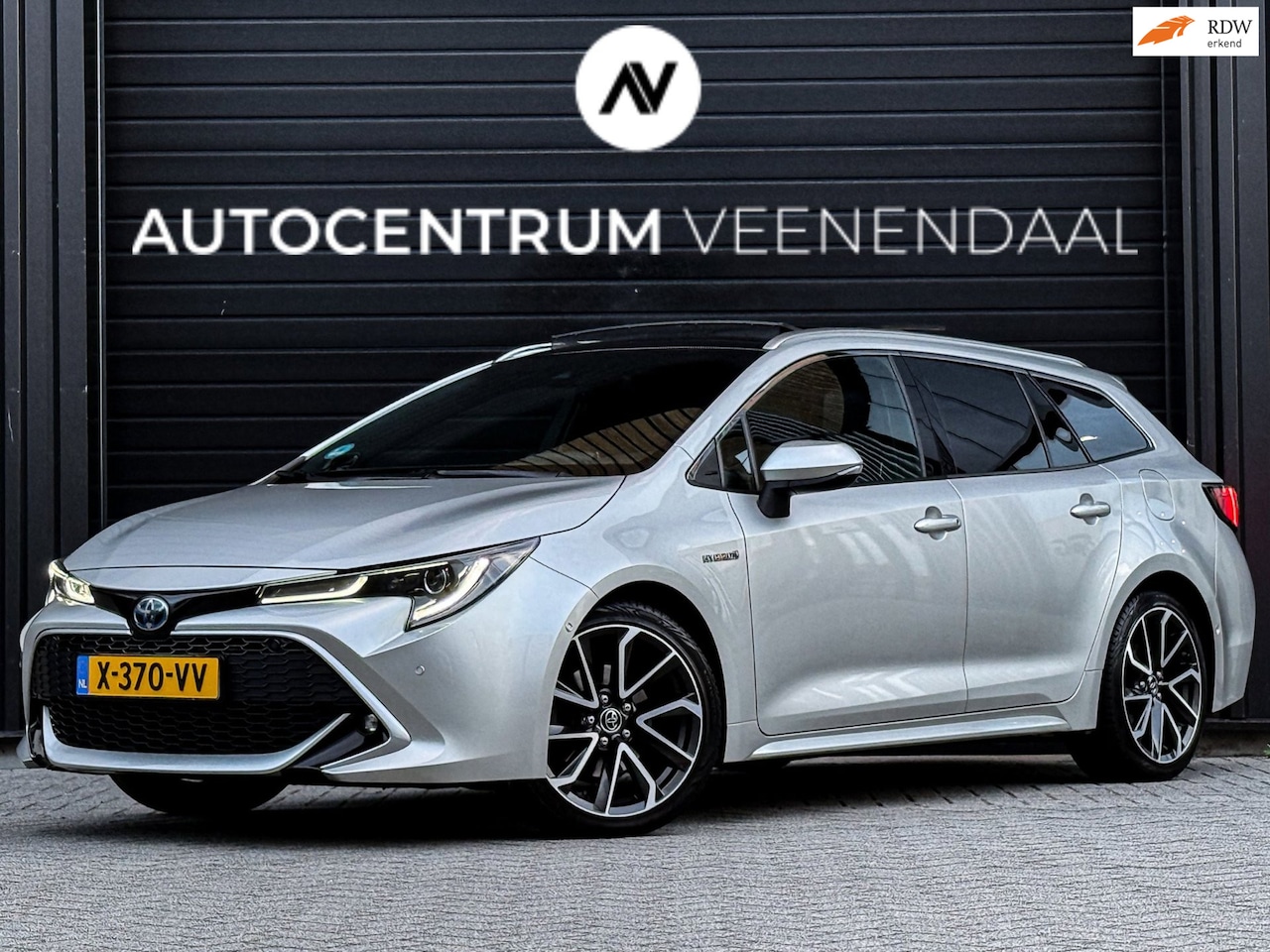Toyota Corolla Touring Sports - 2.0 Hybrid Executive JBL PANO/CAMERA/CARPLAY - AutoWereld.nl