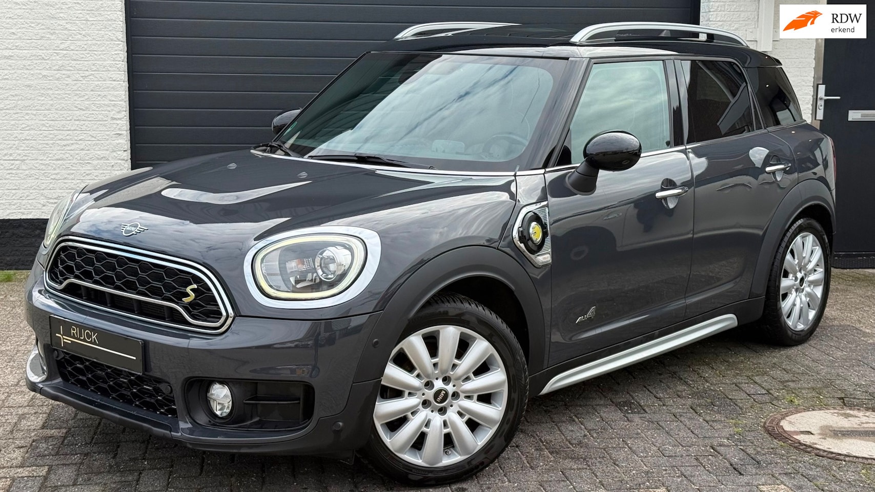 MINI Countryman - 1.5 Cooper S E ALL4 Chili | BTW | Pano | HUD | ACC | Camera - AutoWereld.nl