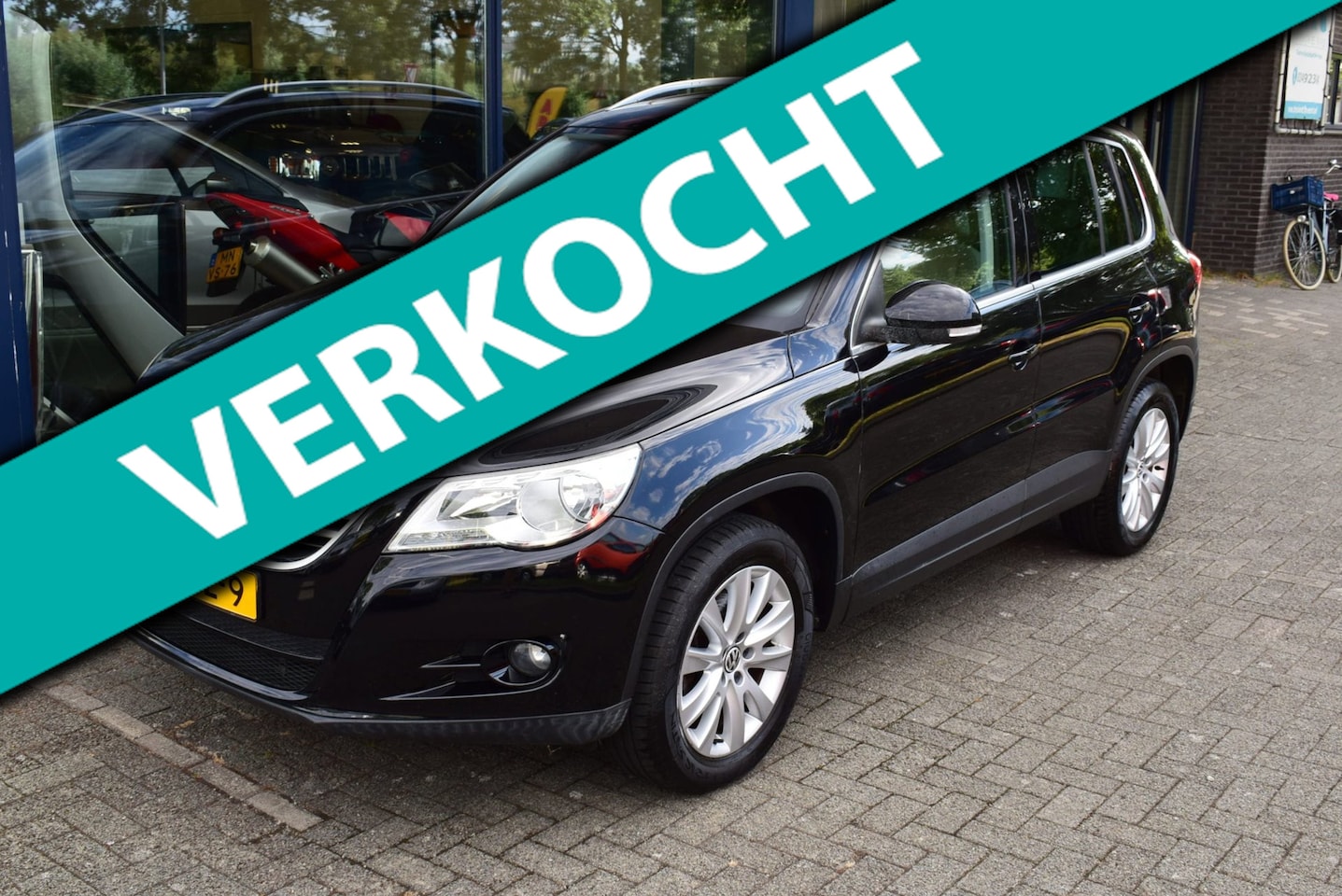 Volkswagen Tiguan - 1.4 TSI Sport&Style 4Motion // Panorama dak, lederen bekleding, trekhaak, climate control - AutoWereld.nl