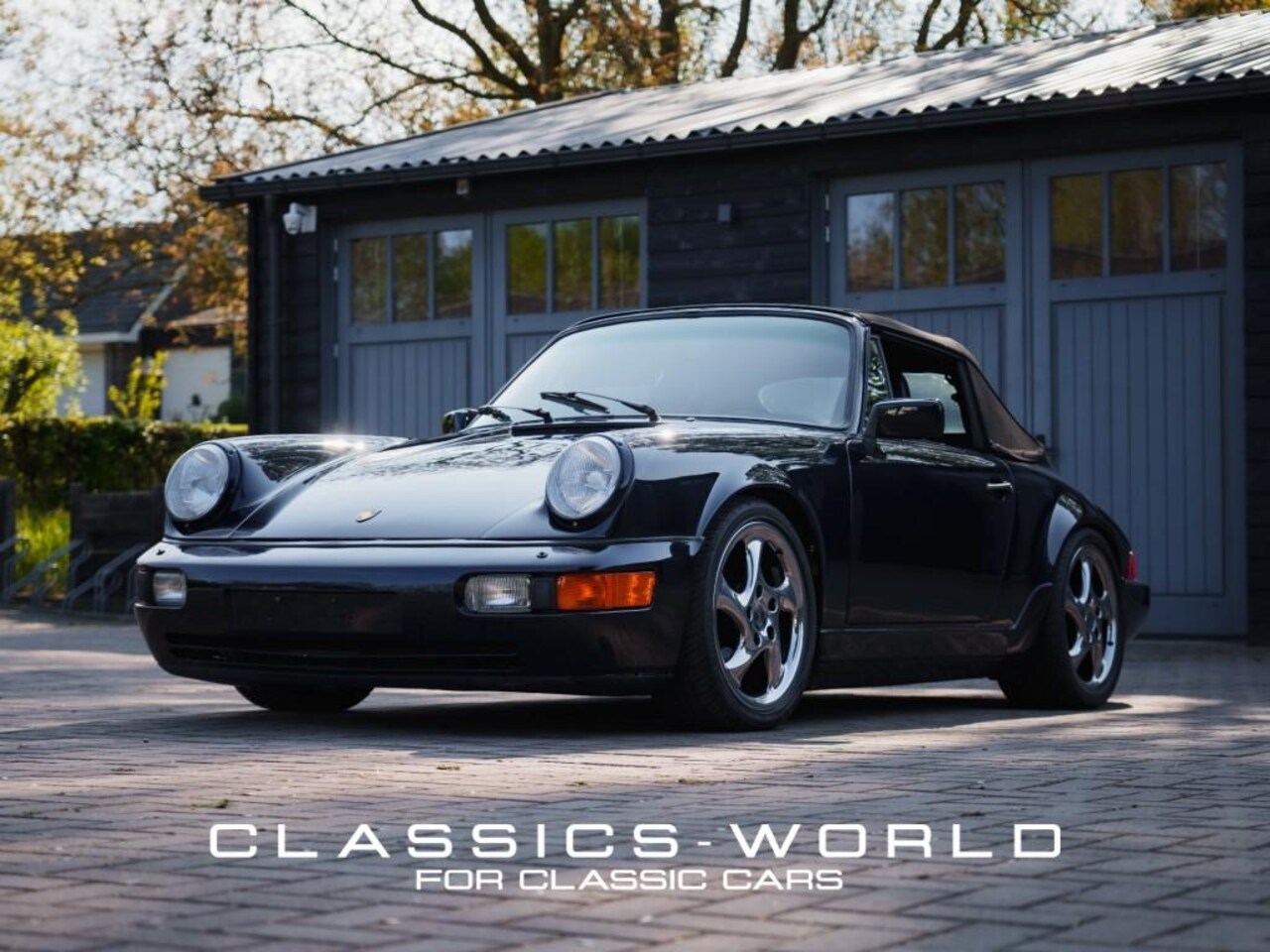 Porsche 911 Cabrio - 3.2 Cabriolet – 1985 – look 964 – Midnight Blue Metallic - AutoWereld.nl