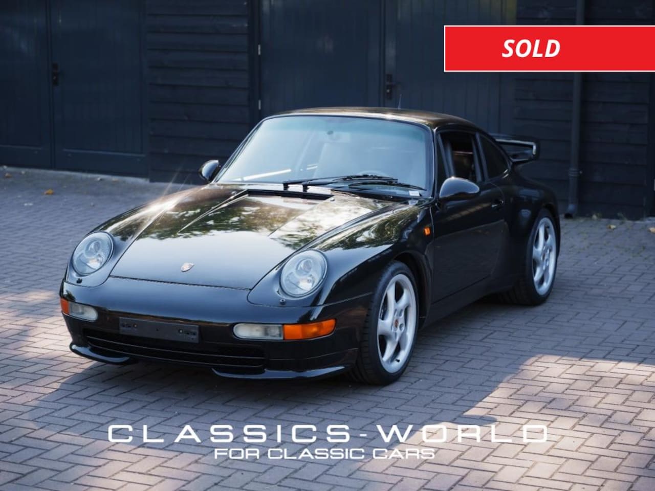 Porsche 911 - Carrera Coupé – Aerokit – Black Metallic – 6-Speed Manual - AutoWereld.nl