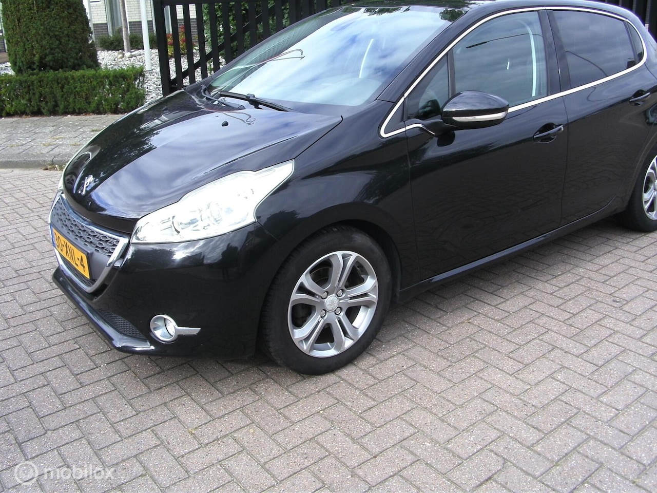 Peugeot 208 - 1.4 VTi Allure bj 2013 128538 nap boekjes - AutoWereld.nl