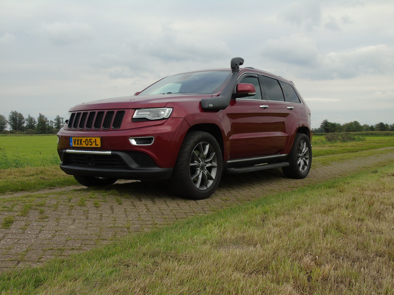 Jeep Grand Cherokee - 3.0 CRD Overland Summit Grijs kenteken - AutoWereld.nl