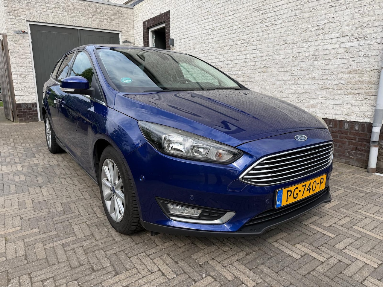 Ford Focus Wagon - 1.0 Titanium Zuinige, luxe comfortabele auto met zomerdag Dual Airco en winterdag Stoelverwarming in sp - AutoWereld.nl