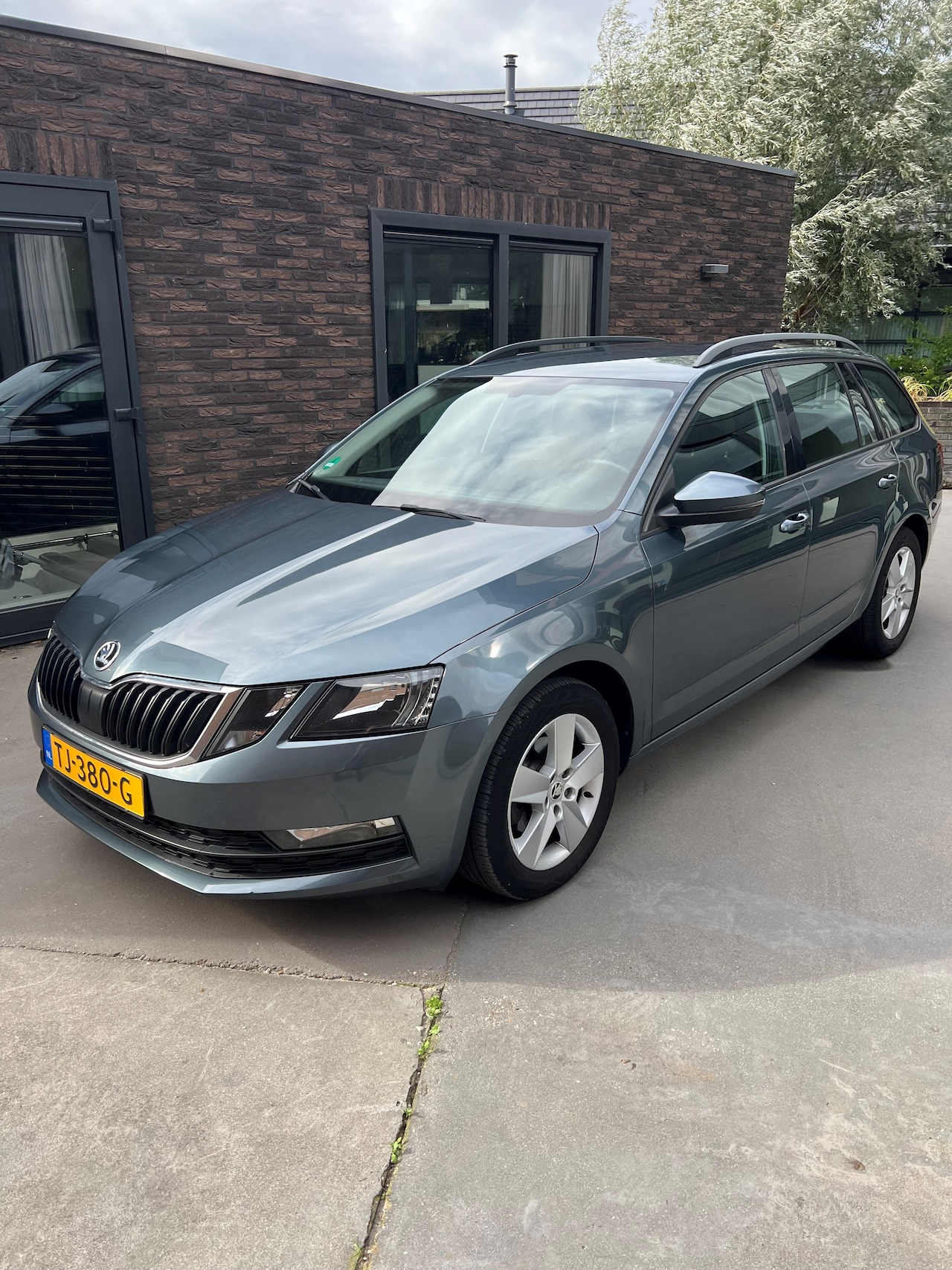 Skoda Octavia Combi - 1.6 TDI Greentech Ambition Business Navigatie Cruise control - AutoWereld.nl