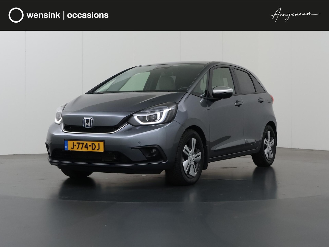 Honda Jazz - 1.5 I-MMD Hybrid Executive | Navigatie | Parkeercamera | Climate Control | Cruise Control - AutoWereld.nl