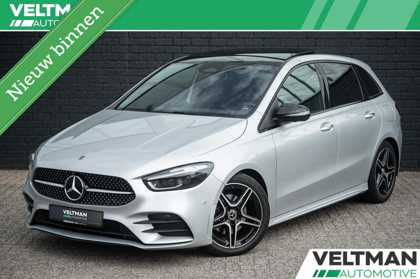 Mercedes-Benz B-klasse - 180 AMG LINE PANORAMADAK TREKHAAK HEAD UP 360 CAMERA STOELVERWARMING - AutoWereld.nl