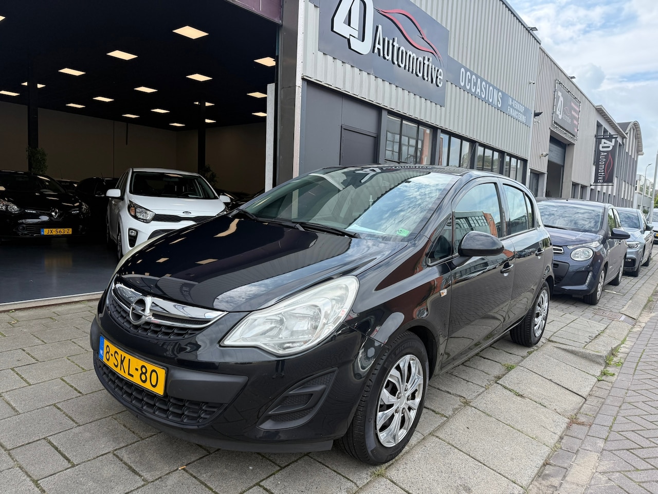 Opel Corsa - 1.4-16V Anniversary Edition 1.4-16V Anniversary Edition - AutoWereld.nl