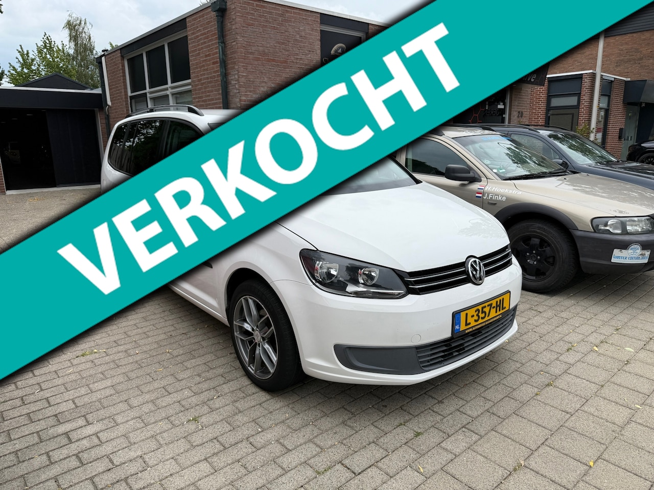 Volkswagen Touran - 1.2 TSI Easyline AIRCO - TREKHAAK - NAVI - NWE APK. - AutoWereld.nl