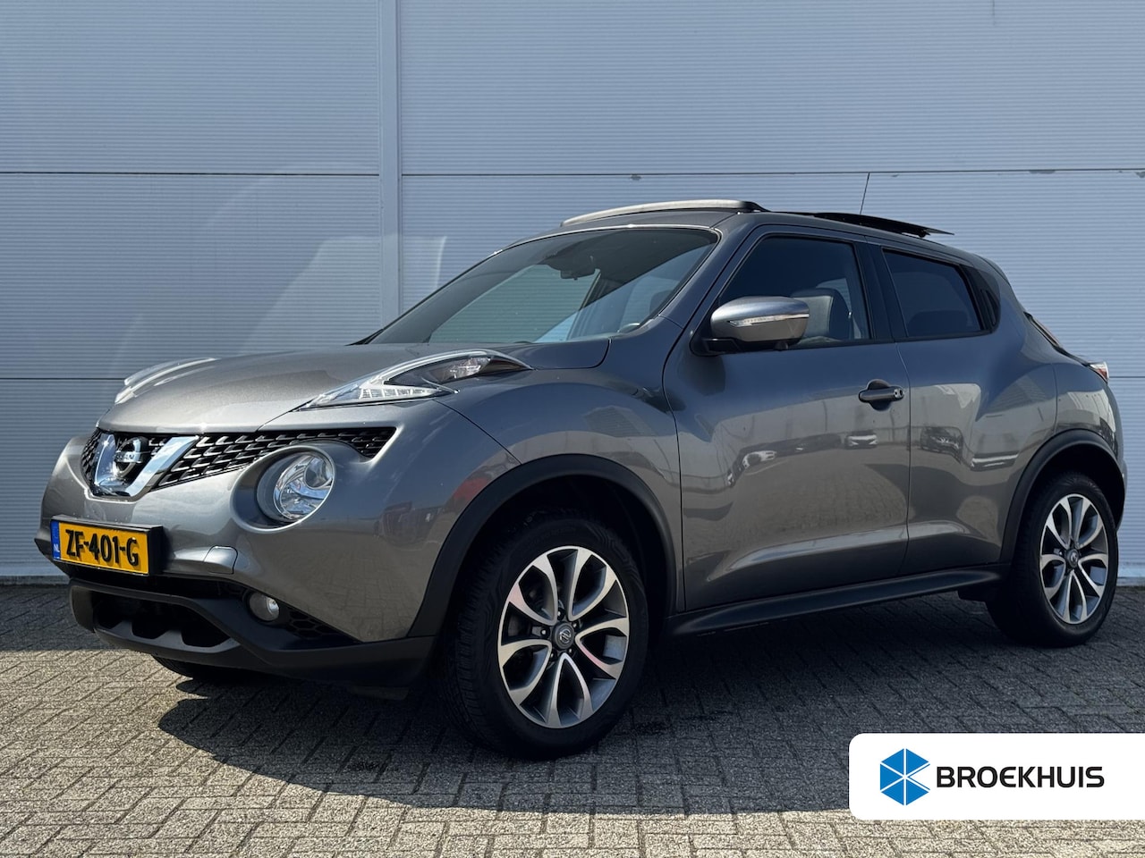 Nissan Juke - 1.6 Tekna / Elektrisch Schuif-/Kanteldak / Panoramadak / Navigatie / Achteruitrijcamera Ro - AutoWereld.nl