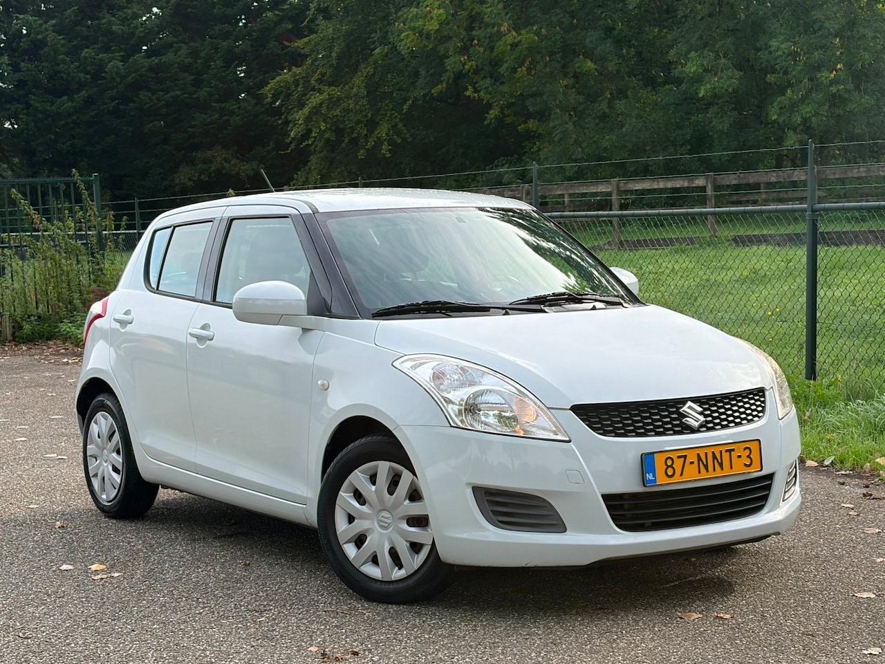 Suzuki Swift - 1.2 Comfort EASSS /Airco/Stoelverwarming/ - AutoWereld.nl