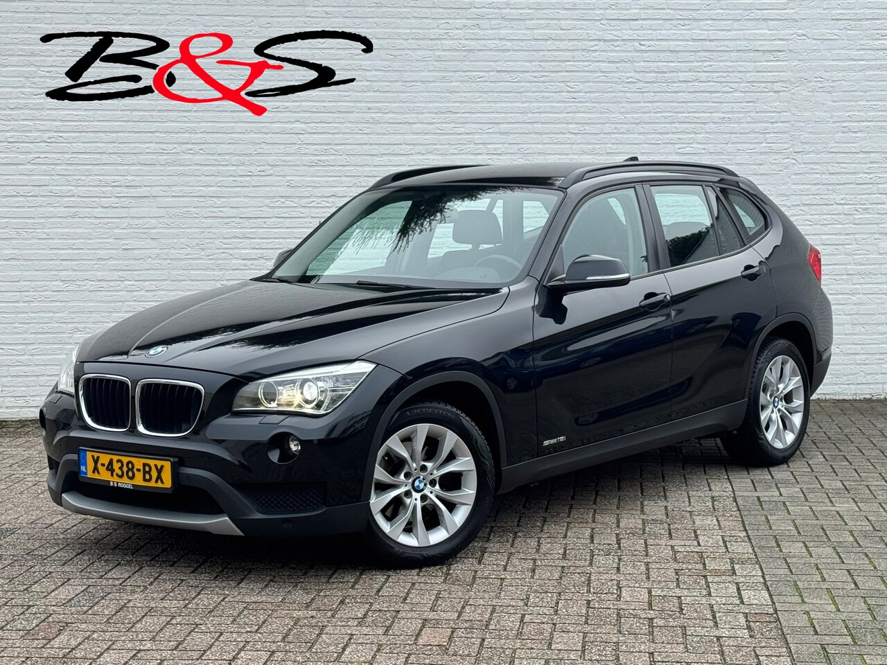 BMW X1 - SDrive18i Cruise control Climate control Navigatie Stoelverwarming - AutoWereld.nl