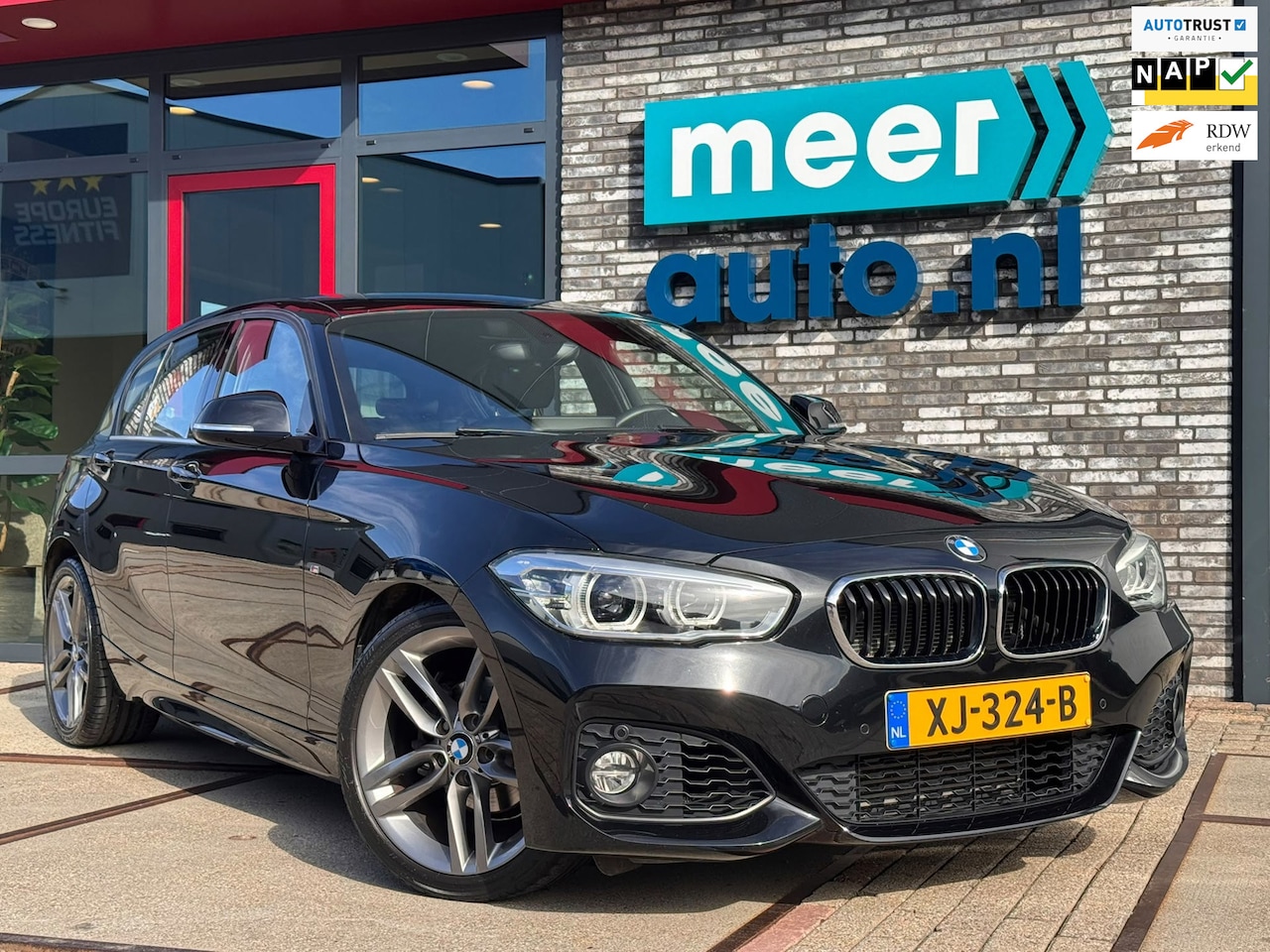 BMW 1-serie - 118i High Executive M-SPORT AUT. NAVI.PROF l LEDER l ST-VERW l 18 INCH l ORG.NL l PDC l DA - AutoWereld.nl