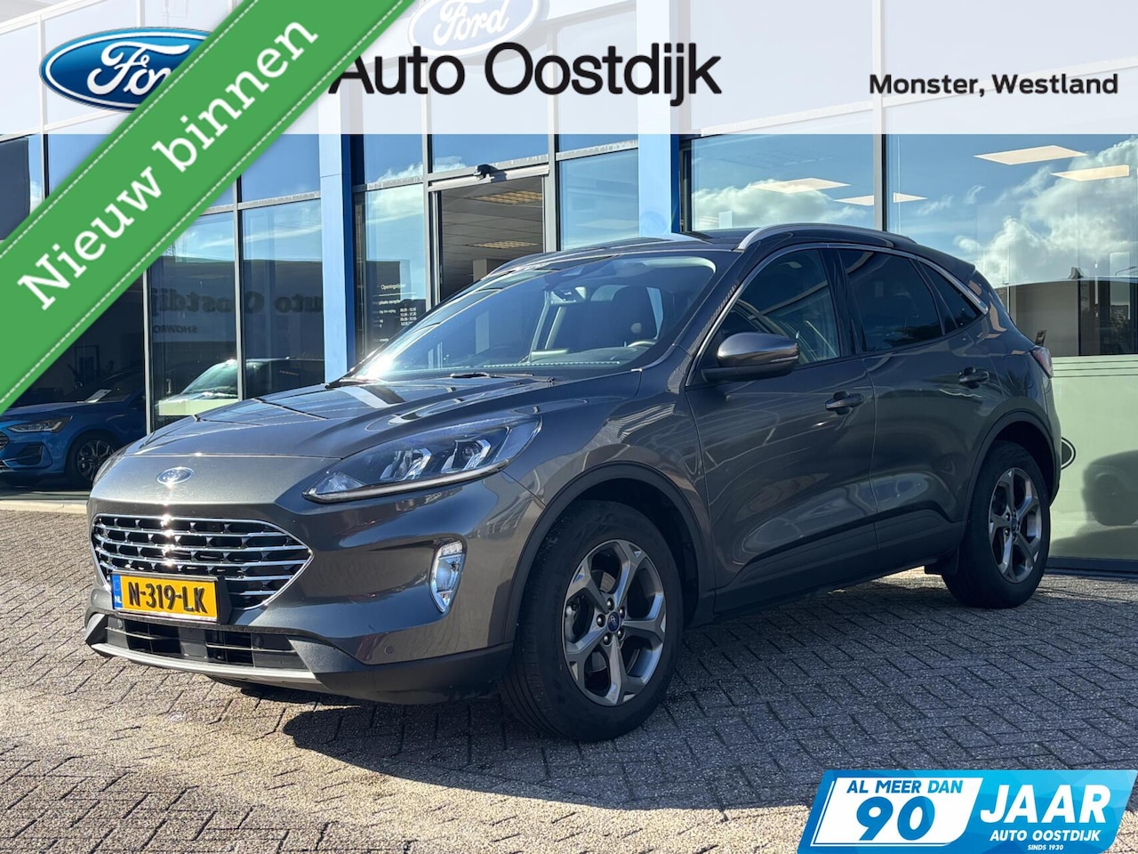 Ford Kuga - 1.5 EcoBoost Titanium 120PK Afn. Trekhaak Winterpack Camera Cruise Navi Climate Keyless Fu - AutoWereld.nl