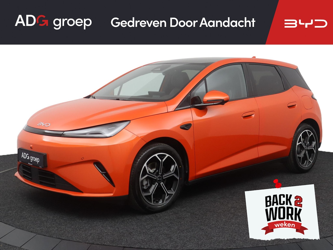 BYD DOLPHIN G - DM-i Sport NIEUW/ 1040 KM / Sunset Orange / 105 EV / 360°-camera / HUD / Sport uitvoering - AutoWereld.nl