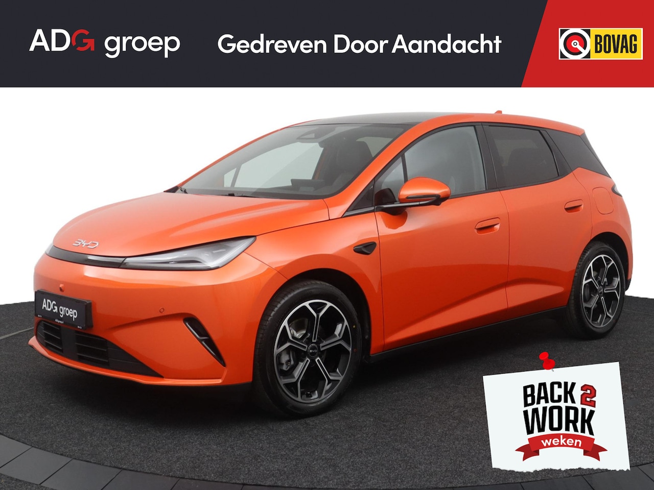 BYD DOLPHIN G - DM-i Sport NIEUW/ 1040 KM / Sunset Orange / 105 EV / 360°-camera / HUD / Sport uitvoering - AutoWereld.nl