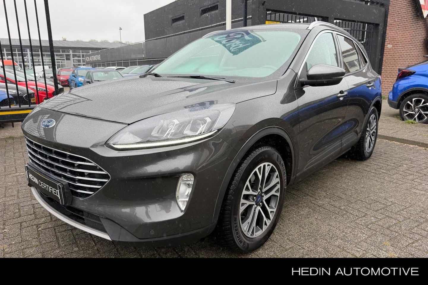 Ford Kuga - 1.5 EcoBoost Titanium | Winterpack | Trekhaak | Camera | All Season | Keyless entry - AutoWereld.nl
