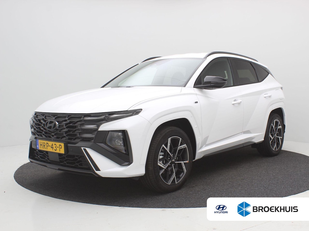 Hyundai Tucson - 1.6 T-GDI PHEV N Line Edition / Navigatie / Leer-Alcantara bekleding met rode stiksel / 19 - AutoWereld.nl