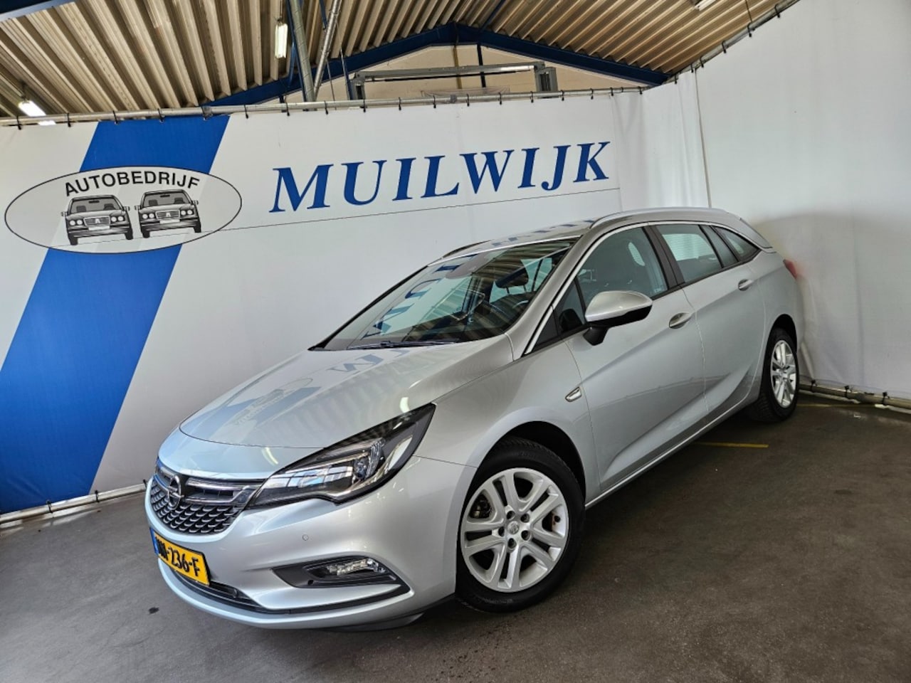 Opel Astra Sports Tourer - Sports Tourer 1.0 Business+ / Navi / Clima / NL Auto - AutoWereld.nl