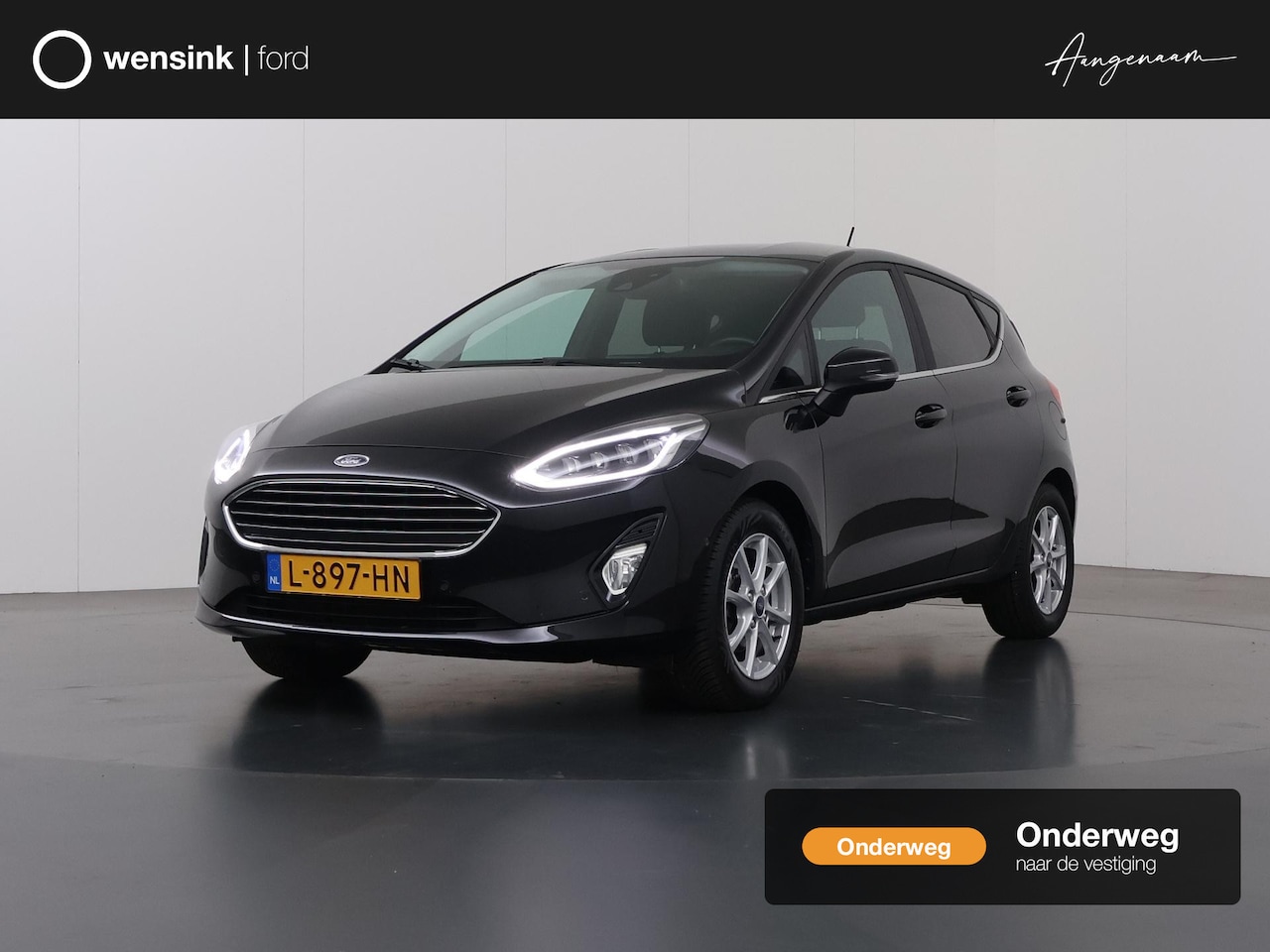 Ford Fiesta - 1.0 EcoBoost Titanium 95pk | Winterpakket | Navigatie | Trekhaak | Parkeersensoren voor en - AutoWereld.nl