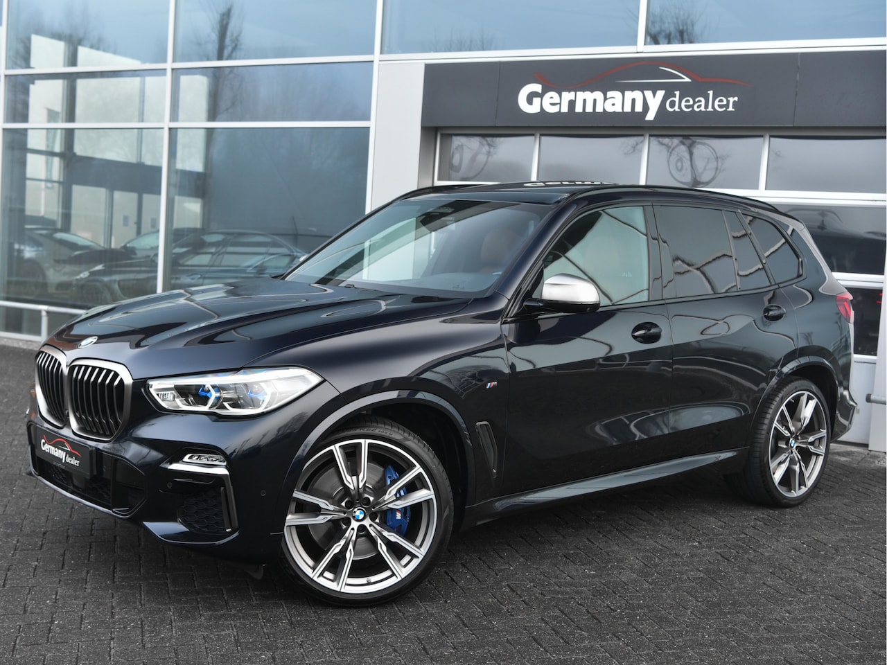 BMW X5 - M50d M-Sportpakket Grijs-kenteken Laser-LED H&K Pano Head-Up Swarovski 22-Inch Ex.BTW - AutoWereld.nl