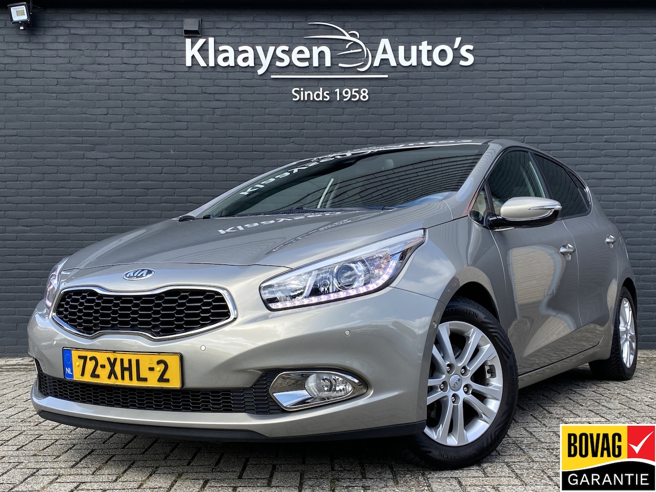 Kia Cee'd - 1.6 GDI Super Pack 136 pk | navigatie | trekhaak | all season banden | keyless go | camera - AutoWereld.nl