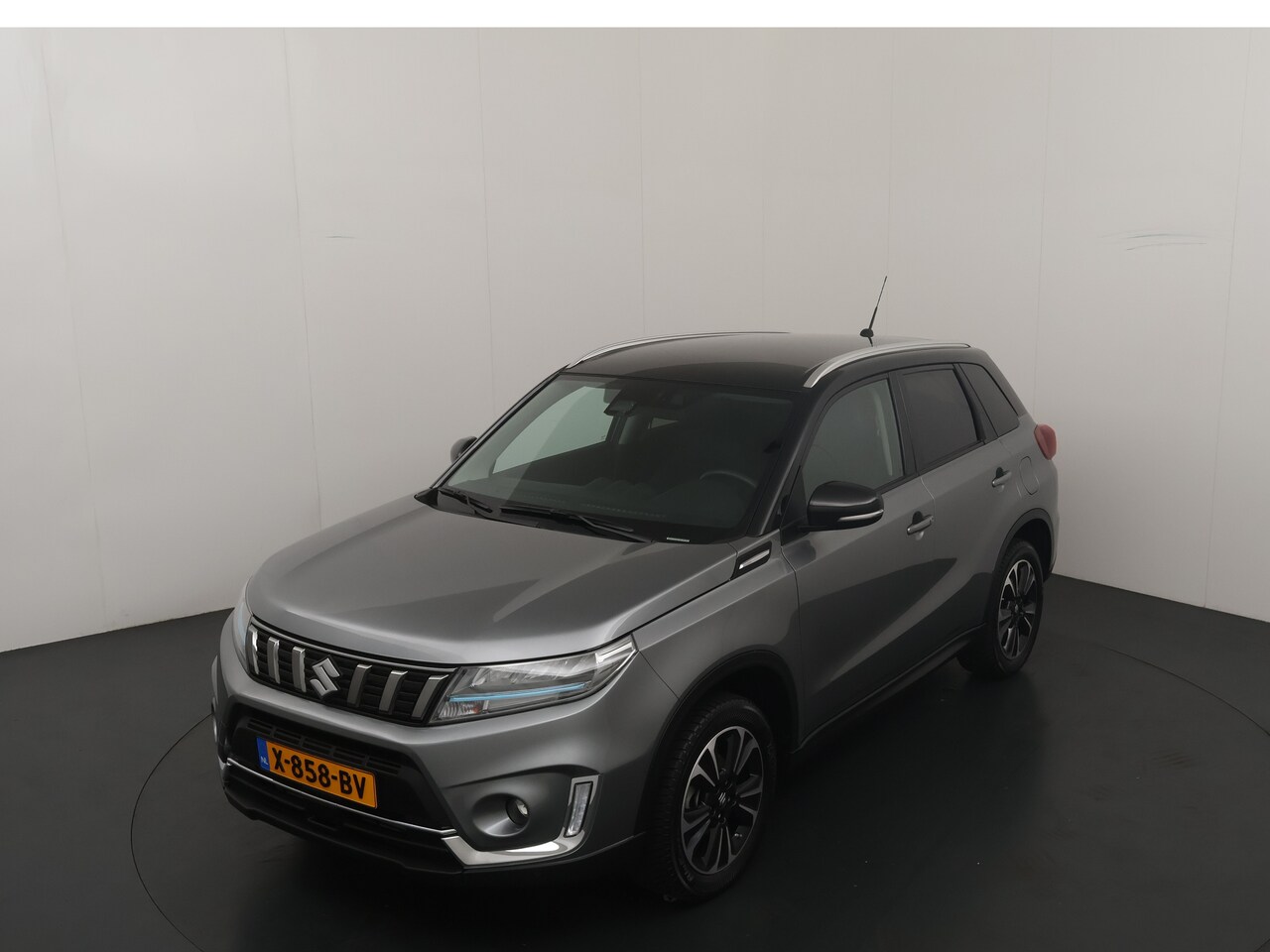 Suzuki Vitara - 1.4 Boosterjet Style Smart Hybrid | Trekhaak | Half leer | Adapt. cruise | 4 seiz. banden - AutoWereld.nl