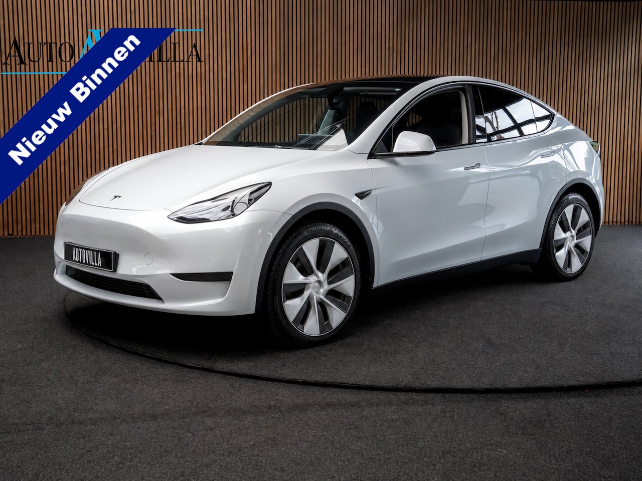 Tesla Model Y - Long Range Dual Motor AWD 351pk Navi Camera Leer Warmtepomp ACC Autopilot PDC Elektr. acht - AutoWereld.nl