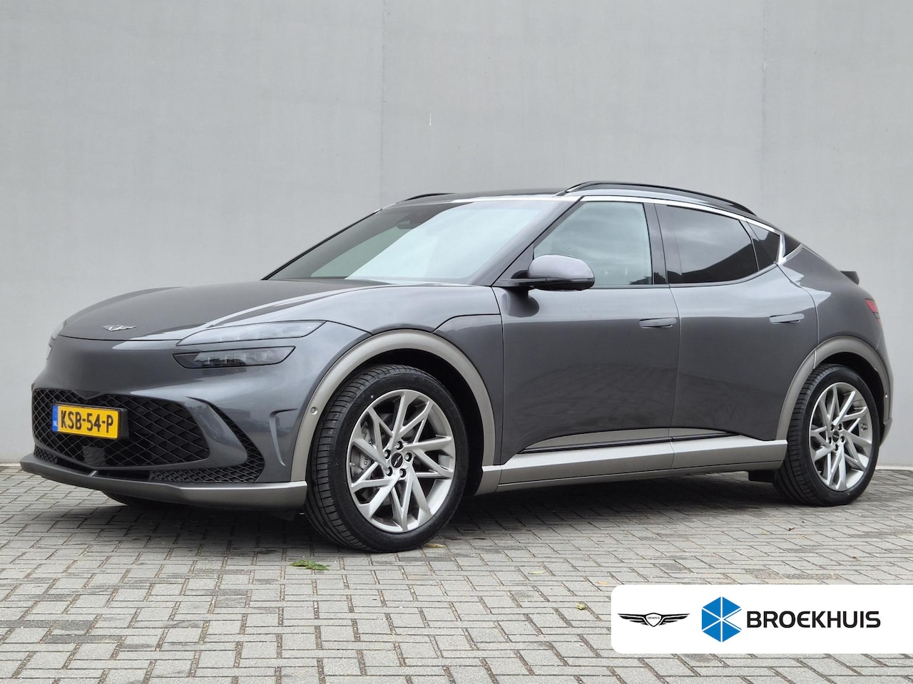 Genesis GV60 - Long Range Sport 74 kWh AWD / SOH 98% / Fabrieksgarantie tot 05-2027 / Dealer onderhouden - AutoWereld.nl